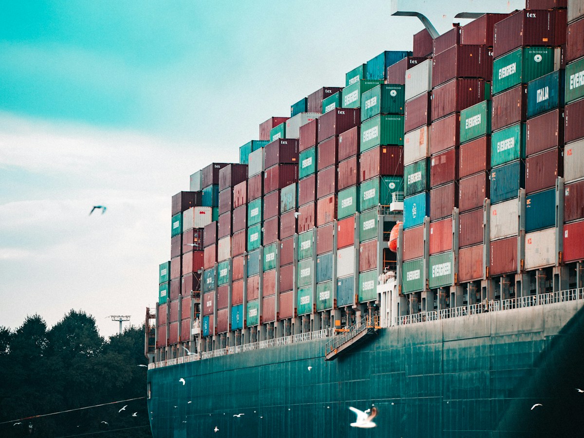 Large cargo ship loaded with containers at sea